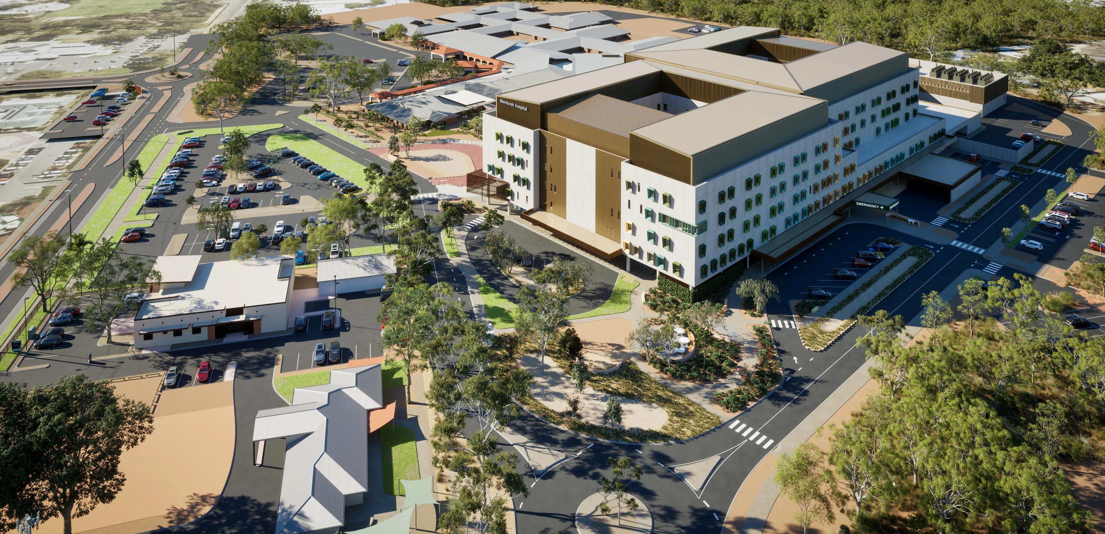 a large building with trees and roads