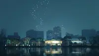 a city skyline with fireworks in the sky