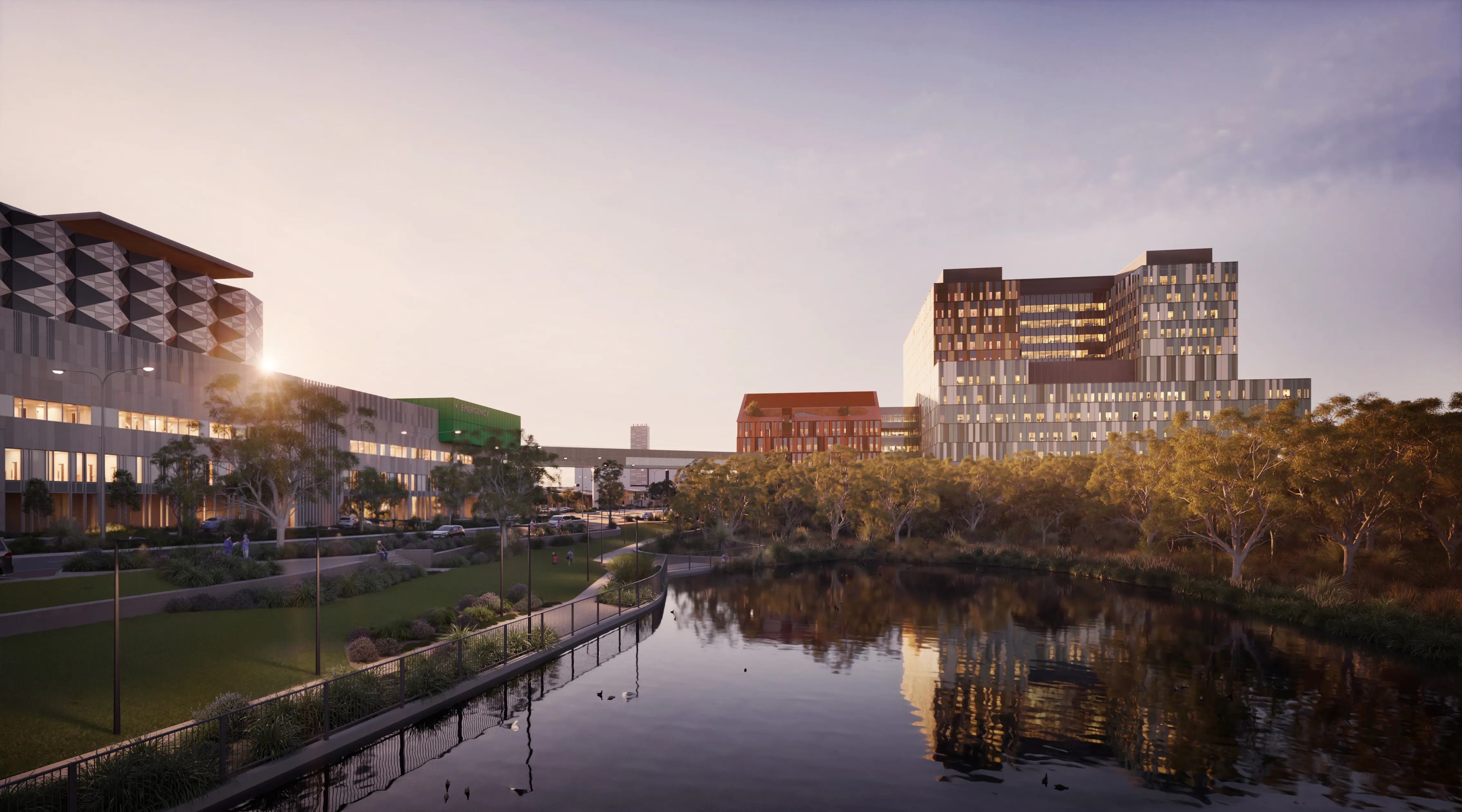 a body of water with buildings and trees