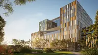 Artist impression of the new hospital building with trees in the foreground