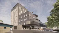 a building with a helicopter flying over it