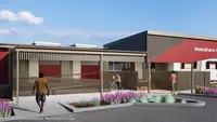 a building with a red awning and a red awning