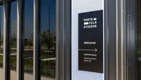 An entrance sign on the main building