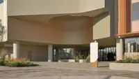 a building with a curved roof