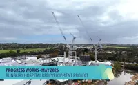 a group of cranes in a city
